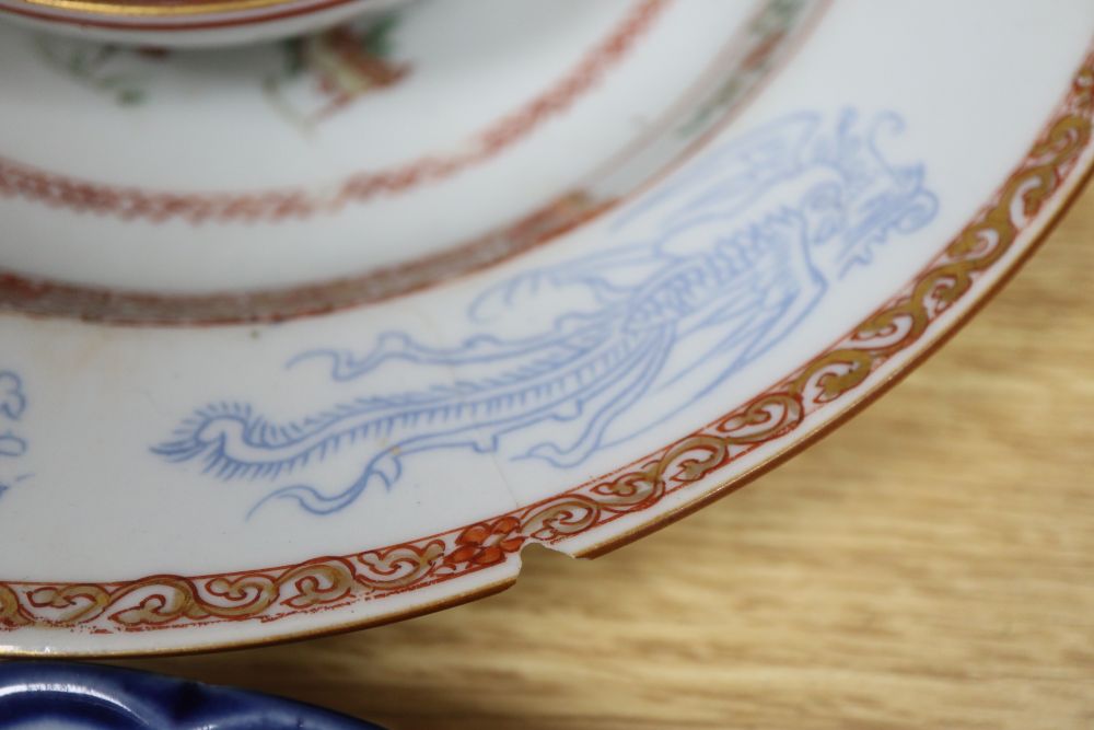 A collection of mixed Chinese and Japanese porcelain and pottery including a Nanking Cargo blue and white tea bowl, a 19th century